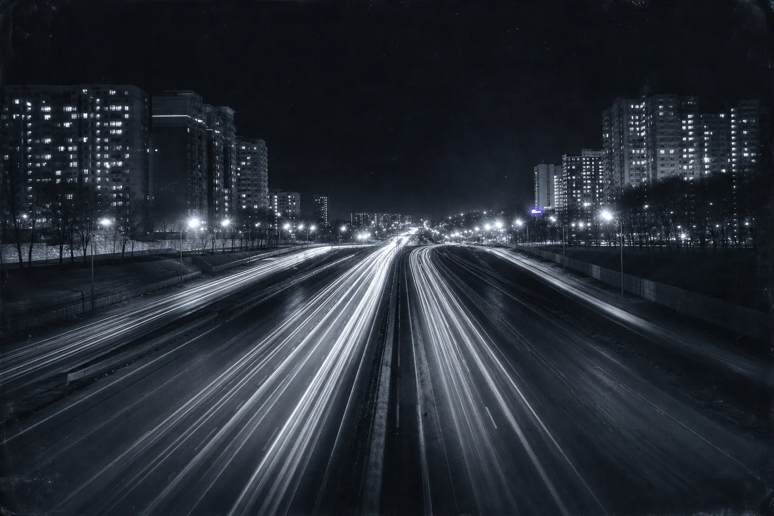The Third Ring Road at rush hour from an overpass: instead of a jam, cars flow freely in long light trails, the lanes almost empty.